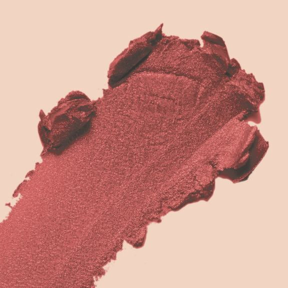 Cremige Textur eines Multi Balm Sticks in Rosé-Braun